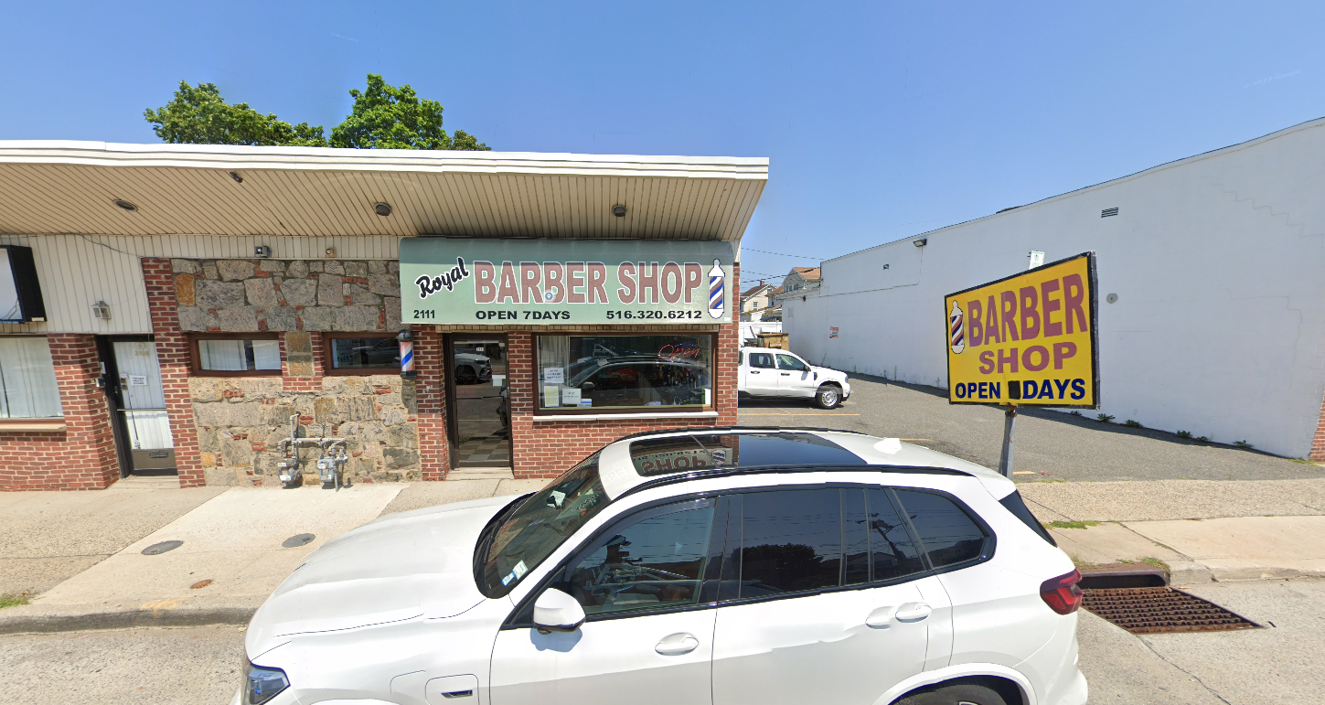 Street view of Royal Barber Shop at 2111 Bellmore Ave